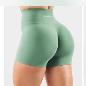 Alphalete Green Bike Shorts with Compression Fit and Wide Waistband